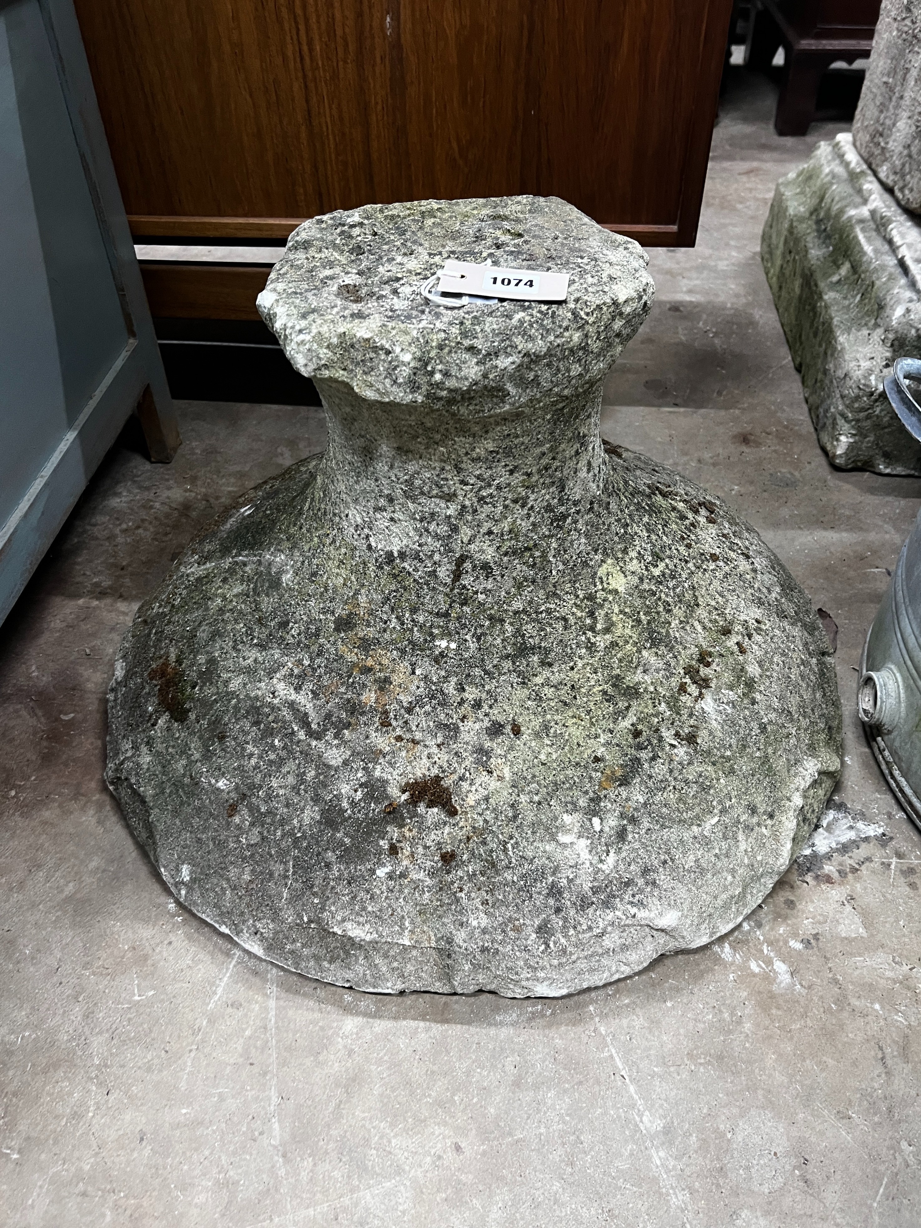 A carved stone plinth, height 38cm